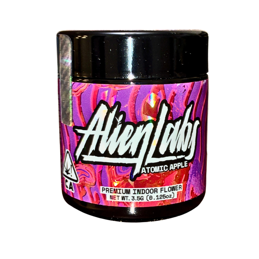 Alien Labs Atomic Apple cannabis strain packaging on a transparent background.