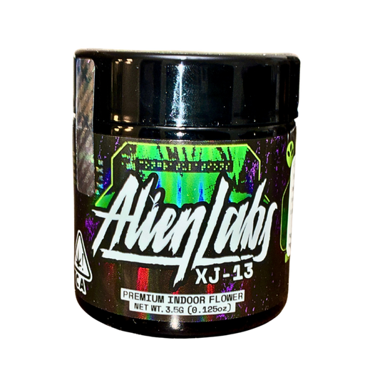 XJ-13 cannabis strain packaging featuring the Alien Labs brand name and strain name on a transparent background.
